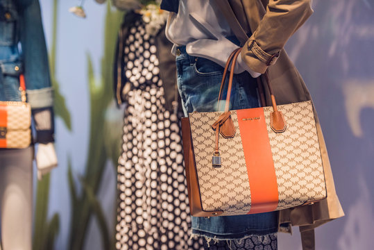 Paris, France - May 6, 2017: Michael Kors handbags in a store in Paris.