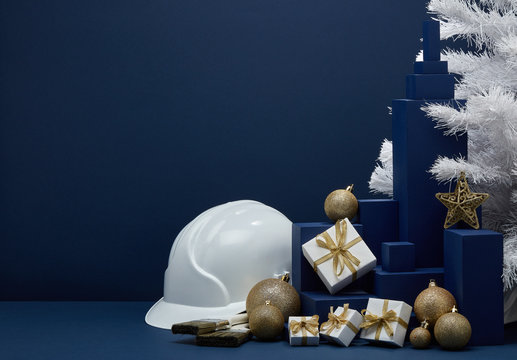 Construction hard hat and Christmas decorations. Christmas and New Year construction