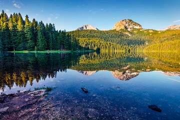Attractive morning view of Black Lake ( Crno Jezero ). Impressive summer scene of Durmitor...