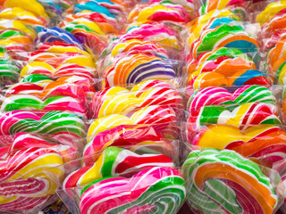Colorful lollipop sweet candy in plastic package