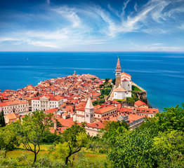 Sunny spring cityscape of Piran port. Magnificent morning seascape of Adriatic Sea. Beautiful...