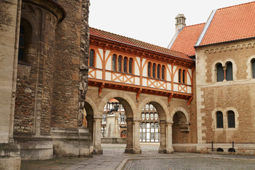 Fototapeta na wymiar Historic old town of Brunswick, Lower Saxony in Germany. Castle Square seen through the archways of the castle and Brunswick Lion statue.