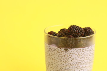 Fototapeta na wymiar glass of chia pudding with blackberry flavor