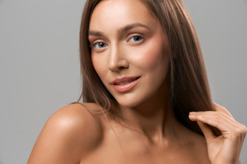 Front view of beautiful smiling woman.