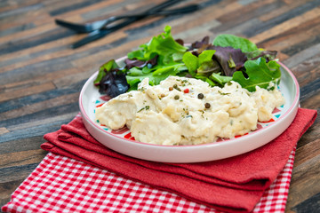 Traditional Parmentier of fish with chives