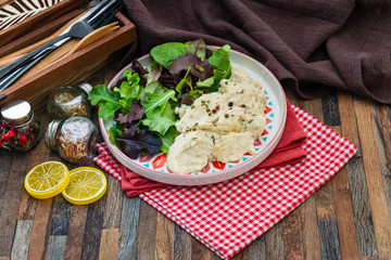 Traditional Parmentier of fish with chives