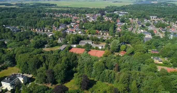 Dutch Village Called Beetsterzwaag, Neighborhood with lots of Trees and Tennis Fields, Friesland, Netherlands / Holland &ndash; 4K Drone Footage