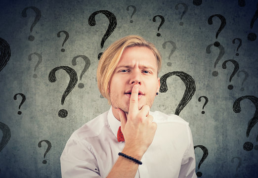 Confused Man With Too Many Questions And No Answer