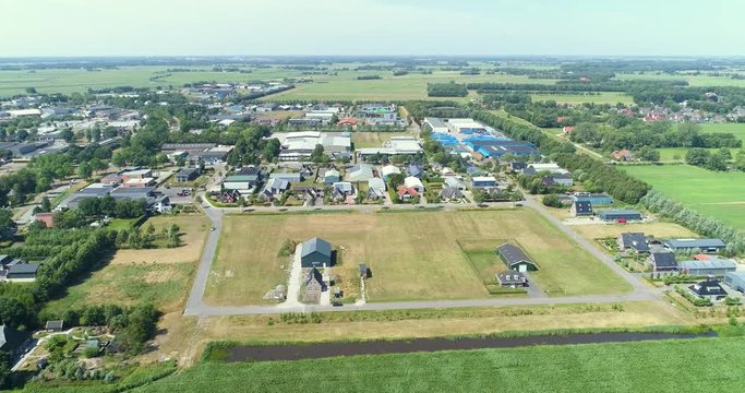 Dutch Village Called Gorredijk, Empty Field Near Industry Terrain, Friesland, Netherlands / Holland &ndash; 4K Drone Footage
