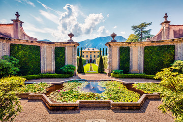 Typical old italian architecture, that can find on the North of country. Sunny summer scene of...