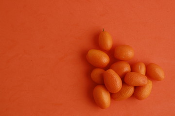small and delicious orange fruits kumquat