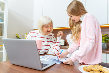Young lady filling in an application form