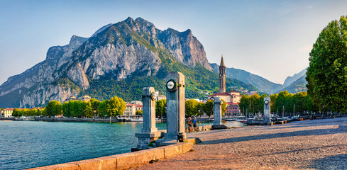Amazing summer scene of Como lake. Wonderful morning cityscape of central park of Lecco town, Italy, Europe. Traveling concept background. - obrazy, fototapety, plakaty