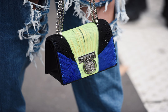 September 28, 2018: Paris, France - Girl wearing a stylish Balmain  hand bag after a fashion show during Paris Fashion Week  - PFWSS19
