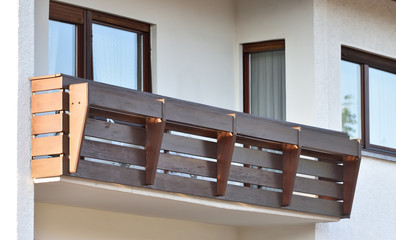 Wooden balcony of a residential building in a residential area of a European city