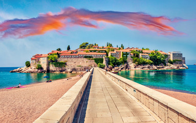 Touristic face of Montenegro - Sveti Stefan, small islet and 5-star hotels resort on the Adriatic coast. Fantastic morning seascape of Adriatic sea, Montenegro, Europe.