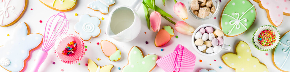 Sweet Easter baking cooking background with traditional Easter bunny and egg cookies, sugar...