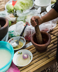 Thai cooking: hand on Thai paste mortar