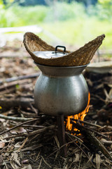 outdoor cooking Thai old kettle on fire