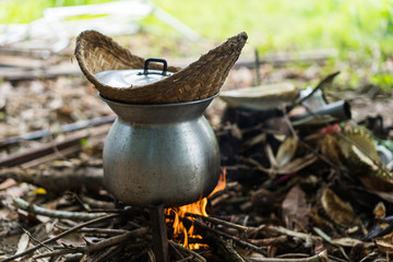 outdoor cooking Thai old kettle on fire