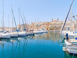 Beautiful ships and the port of Isla. Malta