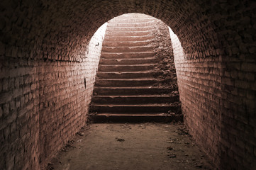 steps on the stairs in a dark dungeon