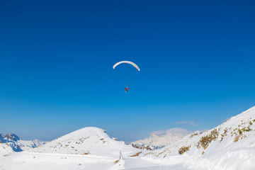 Mountain winter, paraglider Christmas