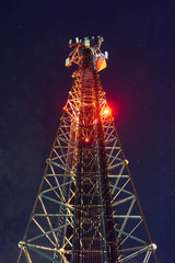Mobile phone Telecommunication Radio antenna Tower. On the tower, work is underway to replace the antenna from 4g to 5g