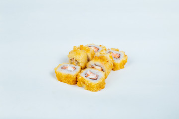 Japanese food Sushi rolls with fish on a white background