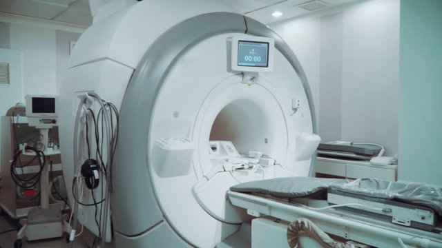 Room with white magnetic resonance tomograph for examination