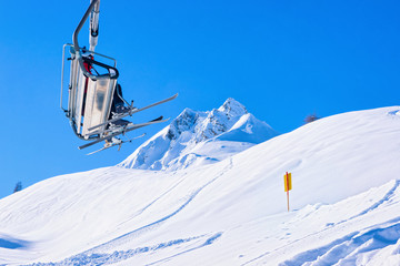 Fototapeta na wymiar Skiers in Chair lifts at Hintertux Glacier in Austria