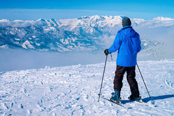 Fototapeta na wymiar Man Skier skiing in Zillertal Arena ski resort Austria