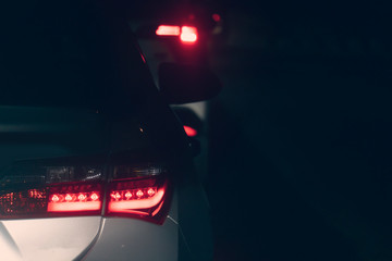 Fototapeta na wymiar Blurred images of light traffic on the night road.