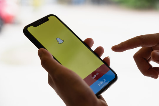 CHIANG MAI, THAILAND - MAY 07,2019: Apple iPhone XS with Snapchat application on the screen. Snapchat is a mobile messaging application for sharing photos, videos, text, and drawings.