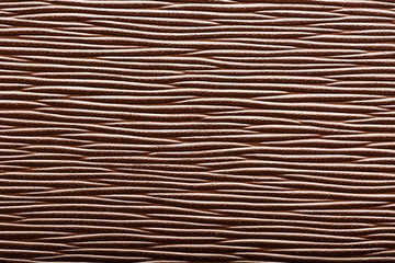 Brown skin texture close up as background. In full screen.
