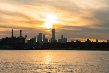 Fototapeta na wymiar Lower Manhattan Skyline on the East River in New York City during Sunset