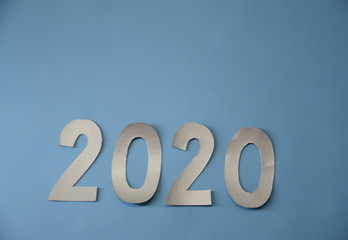 New Year. Holiday. Backgrounds and textures. On a blue background, the numbers 2020.