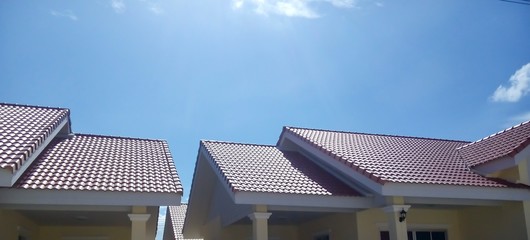 The roof of the house is exposed to the sun and the sky.