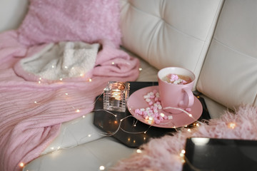 The composition of a Cup with a drink and modern technology without human technology.