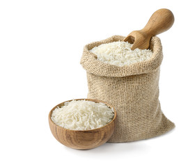 Dry white long rice basmati in wooden bowl and burlap sack with wooden scoop isolated on white...