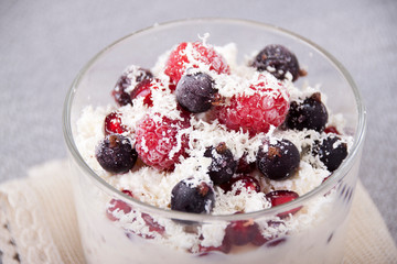 Dessert with cottage cheese, yogurt, oatmeal, berries and white chocolate