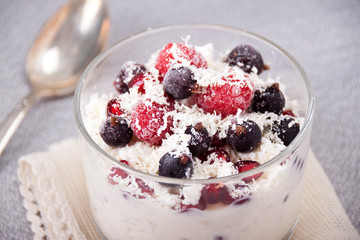 Dessert with cottage cheese, yogurt, oatmeal, berries and white chocolate