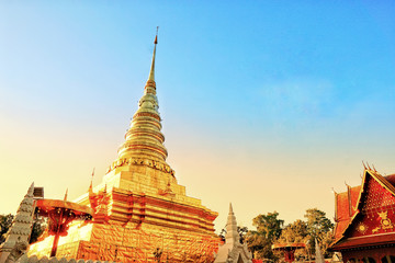 Naklejka premium Wat Phra That Chae Haeng Temple. Golden Pagoda in Nan Province, Thailand.
