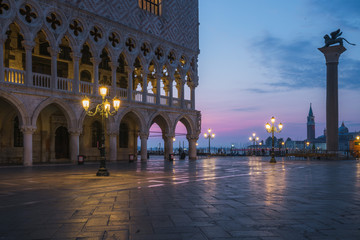 Fototapeta na wymiar Early morning in San Marco Square without people in Venice before sunrise, Italy