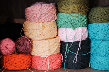 Full Frame Shot Of Multi Colored Woolen Balls On Shelf At Shop