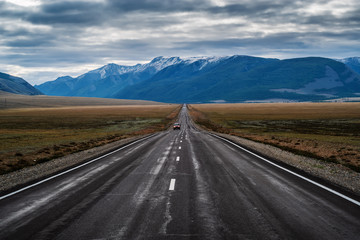 Chuysky tract at dawn, landscape with a highway. Russia, mountain Altai
