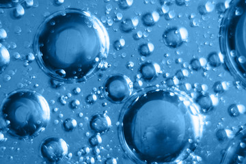 background texture water drops macro concept. design, paint. Planets, universe, space, constellation. atoms, molecules, physics. Fresh classic Pantone 2020 in blue. Color concept of the year.