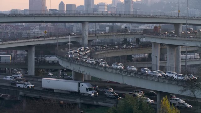 Time lapse of traffic slowly leaving Portland, Oregon on Interstate freeways.