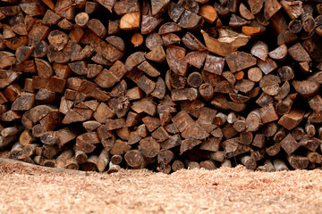 Texture of a traditional firewood pile, commonly found in rural areas of Asia, especially Indonesia.