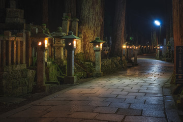 Ancient Cemetery at night inside a forrest, Okunoin Cemetery, Wakayama, Japan.